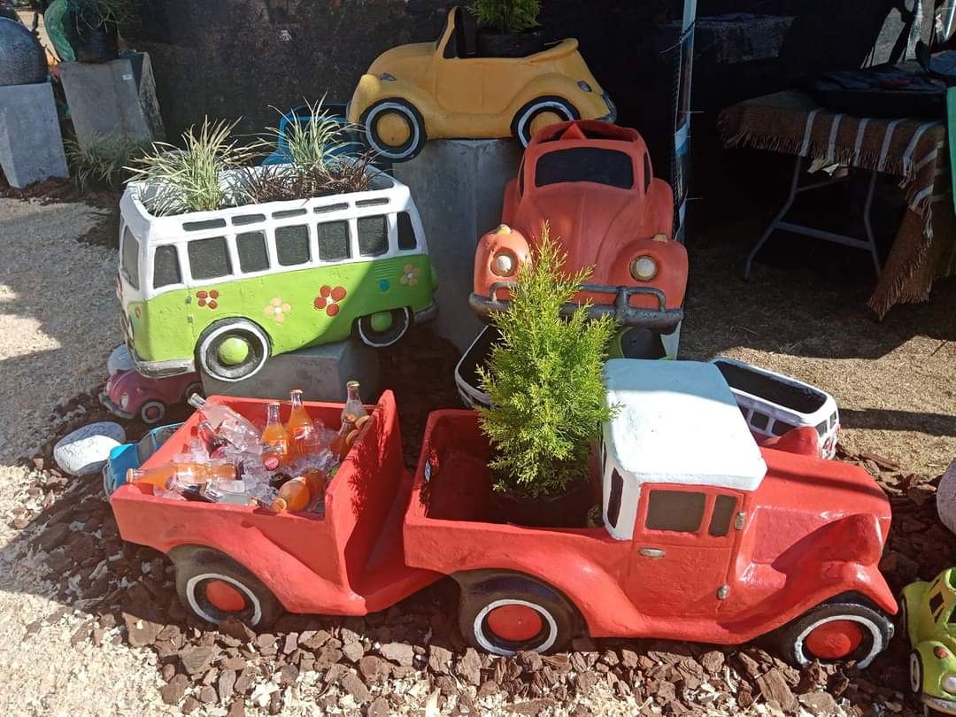 Painted kombi and vintage car planters