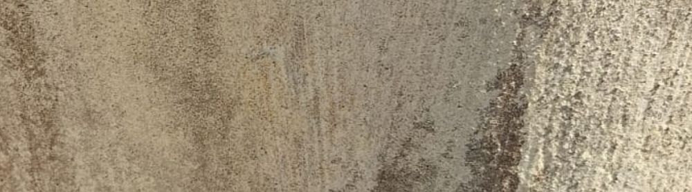 Rust Cream Dry Brush finish on concrete
