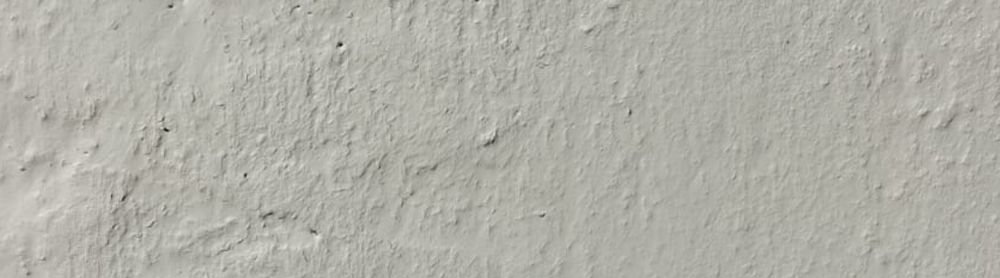 Unpainted raw concrete finish